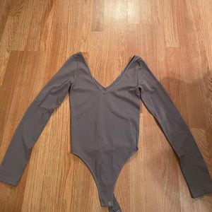 Light purple bodysuit worn once